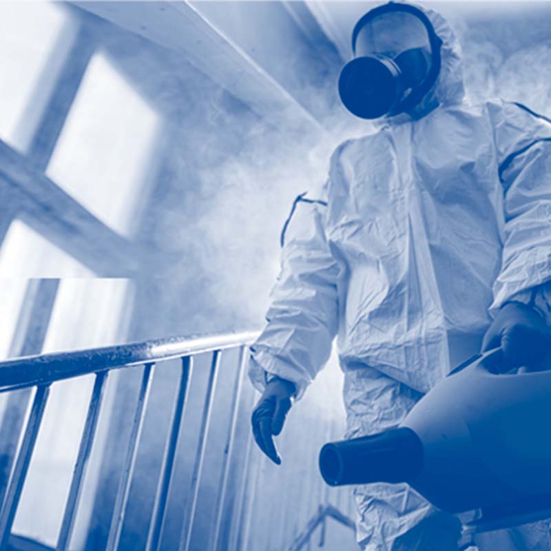Cleanse Force UK technician in protective equipment during a biohazard cleaning job